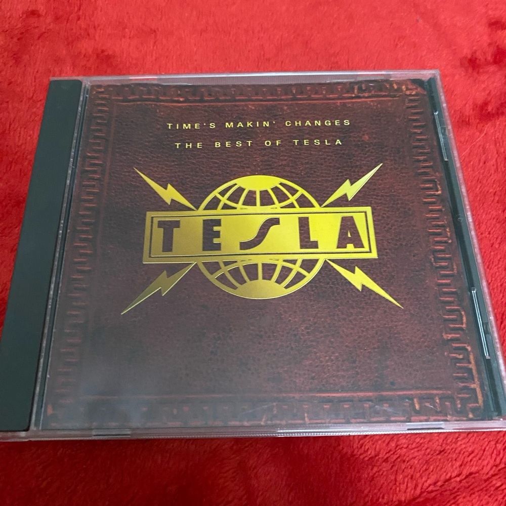 Tesla Best of Album with Brown and Gold Cover